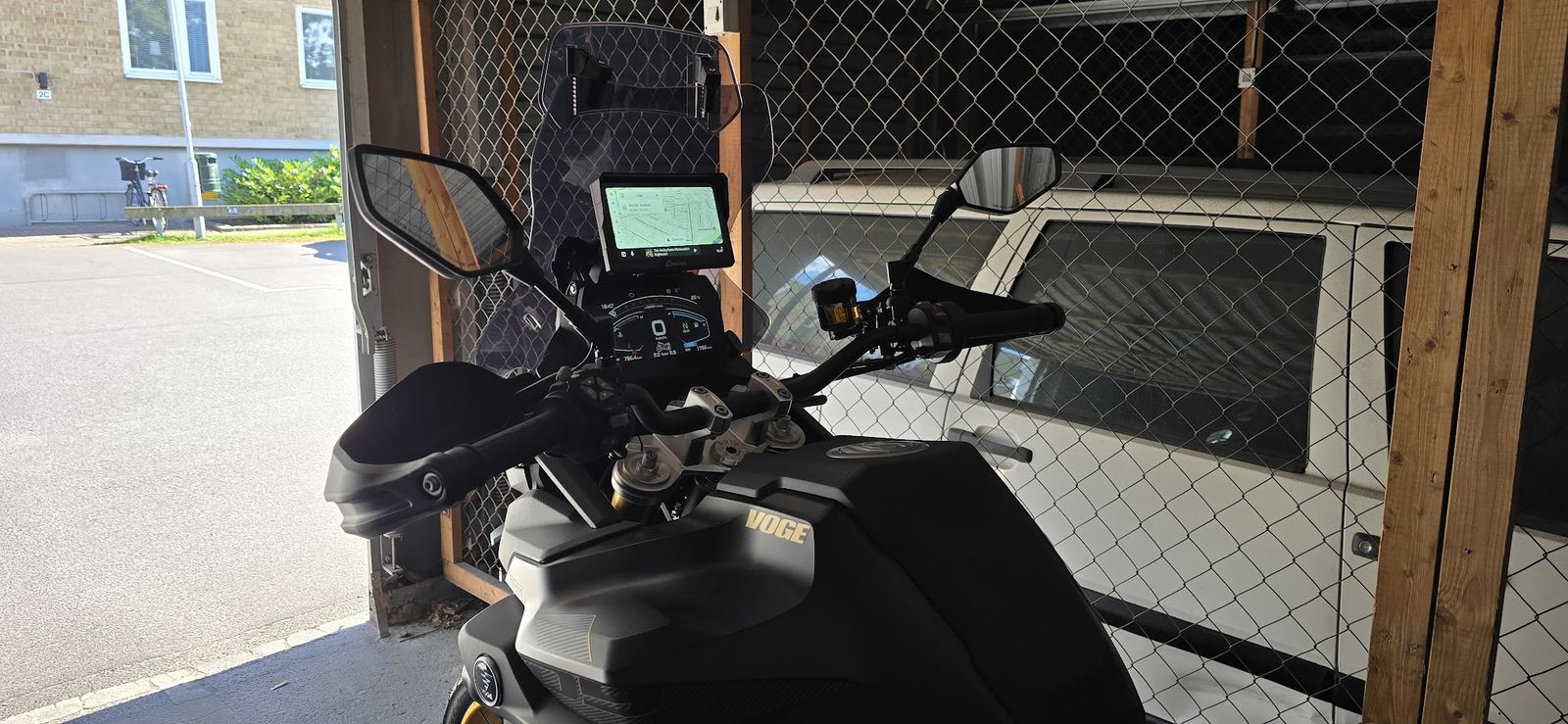 Carpuride W702S Pro mounted above the stock dash on the DS900X